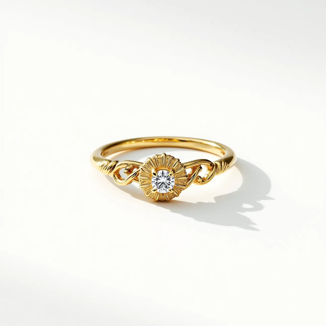 This promise ring features a gold band adorned with a single round-cut gemstone at its center. The stone is set in a unique and ornate setting, resembling a flower with petal-like details that draw attention to the center. The band incorporates intertwining design elements that add to its elegance and charm, creating a sense of continuity and harmony in the overall design. The use of gold and the central gemstone highlight its symbolic meaning and aesthetic appeal.