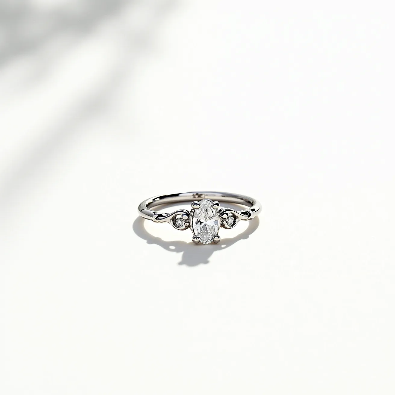 This Rapunzel promise ring features a delicate band likely crafted from a sleek, polished metal such as white gold or platinum, enhancing its elegant and timeless appearance. At the center, an oval-cut diamond is prominently set, drawing attention with its brilliant sparkle. Flanking the central stone, two smaller round diamonds are set into the band, adding extra glimmer and sophistication to the design. The ring's beauty is further accentuated by the symmetrical arrangement of the stones, which are securely held in place by prongs, ensuring both safety and display of the gems' full brilliance. The overall design exudes a sense of classic romance and commitment.