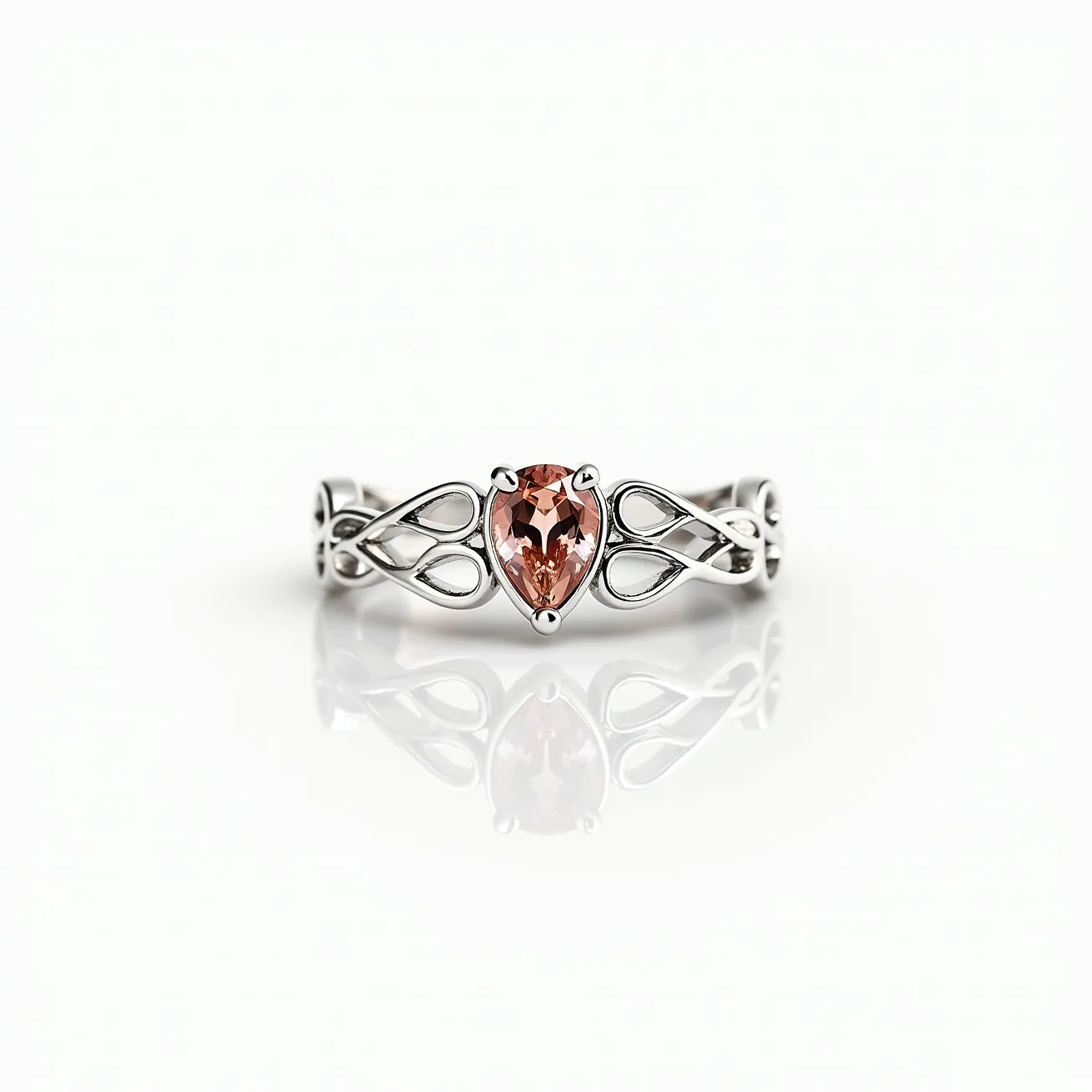 The rapunzel promise ring features a delicate and intricate design crafted from a polished silver-toned metal, giving it a lustrous and elegant appearance. At its center, there is a pear-shaped gemstone with a warm, peachy-pink hue, set in a secure prong setting that highlights its brilliance and sophisticated cut. The band is adorned with intricate, interwoven vine-like patterns, enhancing its fairy-tale charm. The absence of a visible clasp or attachment emphasizes the seamless unity of its design, making it a stunning symbol of commitment and enchantment.