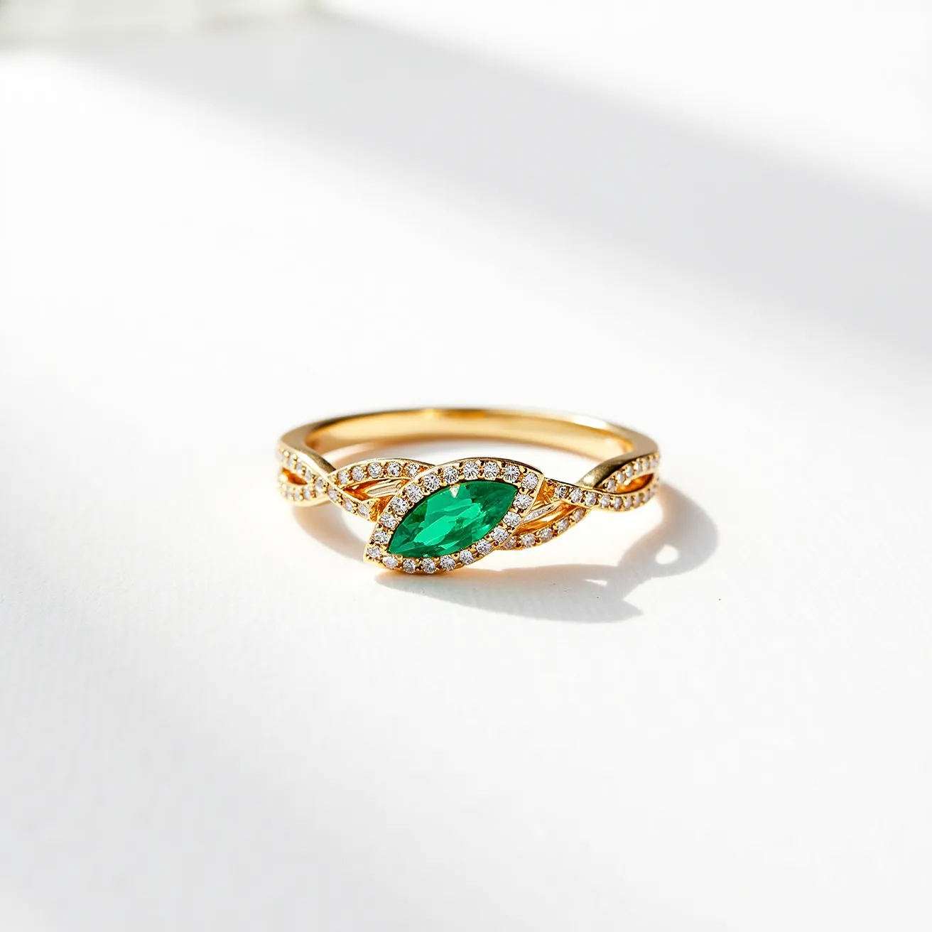 This Rapunzel ring features a stunning marquise-cut green gemstone as its centerpiece, set in a gold band that exudes elegance and charm. The gemstone is bordered by a delicate halo of small, sparkling diamonds, enhancing its vibrant hue and adding a touch of sophistication. The band showcases an intricately twisted design that resembles Rapunzel's braided hair, incorporating additional small diamonds to add brilliance throughout. The combination of the marquise-cut stone and the intricate band design makes this ring a captivating and unique piece of jewelry.