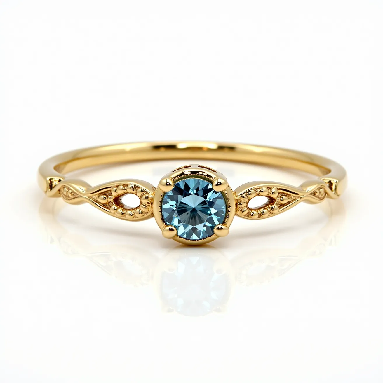 This ring band features a beautifully crafted gold setting, showcasing a central round-cut blue gem held securely in place by a four-prong setting. The gold band is elegantly designed with delicate, interwoven loops on each side of the central stone, adding an artistic touch to its structure. No visible clasp or attachment is present, suggesting a smooth, continuous band. The combination of the gem's brilliant hue and the rich gold metal creates a timeless and sophisticated piece.