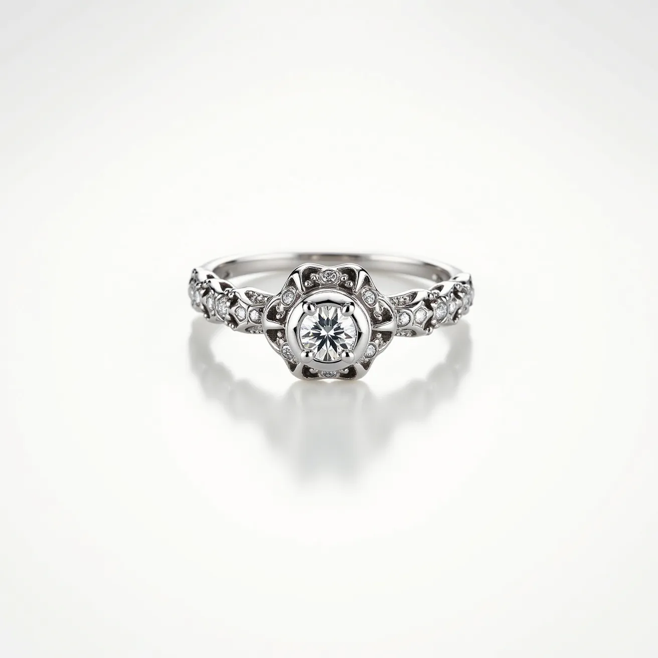 This rose ring features a beautifully intricate design crafted from silver or white gold, showcasing an elegant and timeless aesthetic. The centerpiece of the ring is a round-cut diamond set in a bezel setting, accentuated by smaller round diamonds embedded along the band, adding a sparkling embellishment that enhances the overall allure. The ornate design resembles the delicate petals of a rose, with detailed metalwork that elegantly frames the central stone, offering a harmonious blend of modern craftsmanship and classic style. The band demonstrates a seamless, polished finish, ensuring comfort and elegance in its wear.