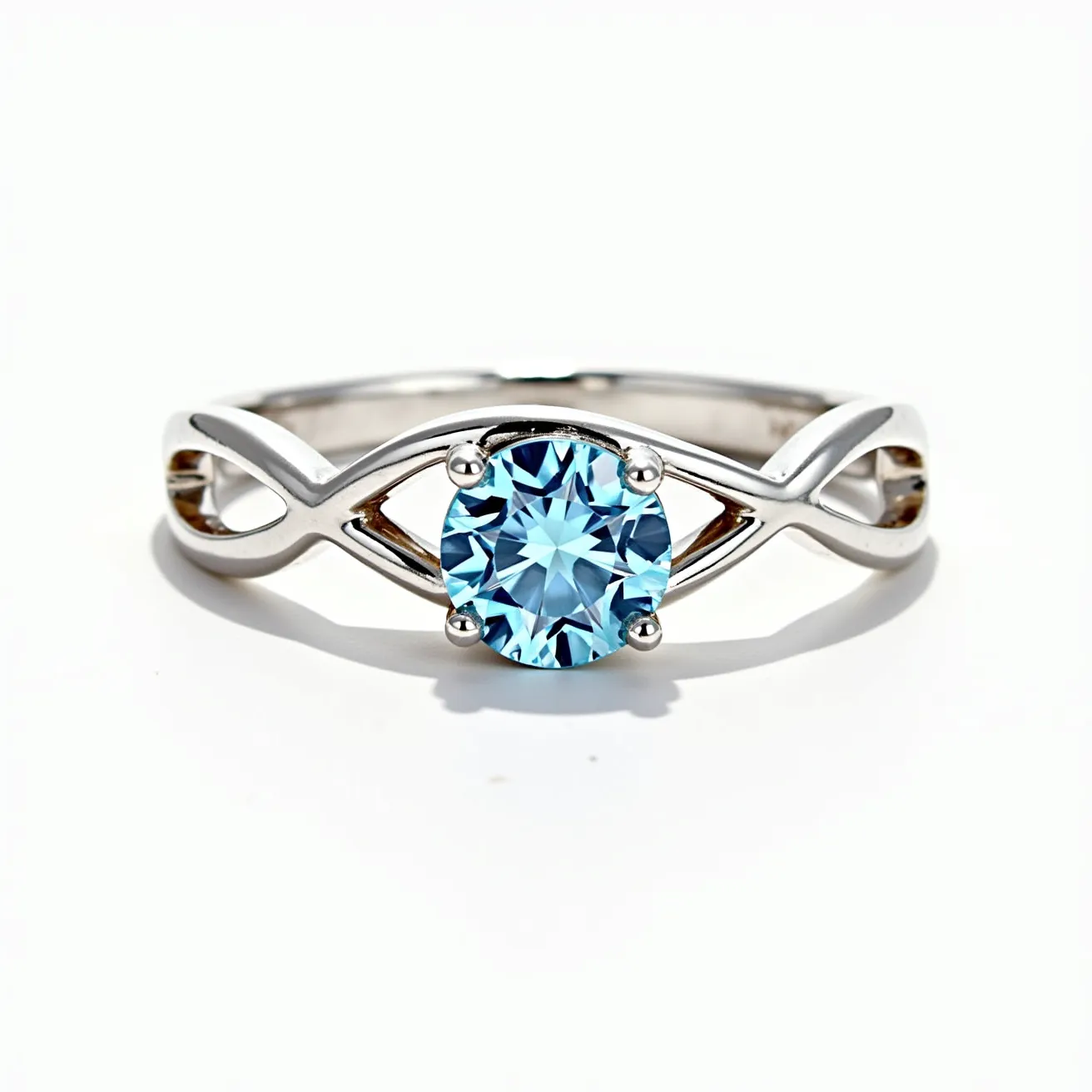 This silver promise ring features a beautifully crafted, polished band with an elegant infinity design. At its center lies a brilliant, round-cut blue gemstone, securely set in a classic four-prong setting that allows it to catch the light from multiple angles. The combination of the bright silver and the vivid blue stone creates a striking visual contrast. The open design of the band complements the central gem, enhancing its prominence.