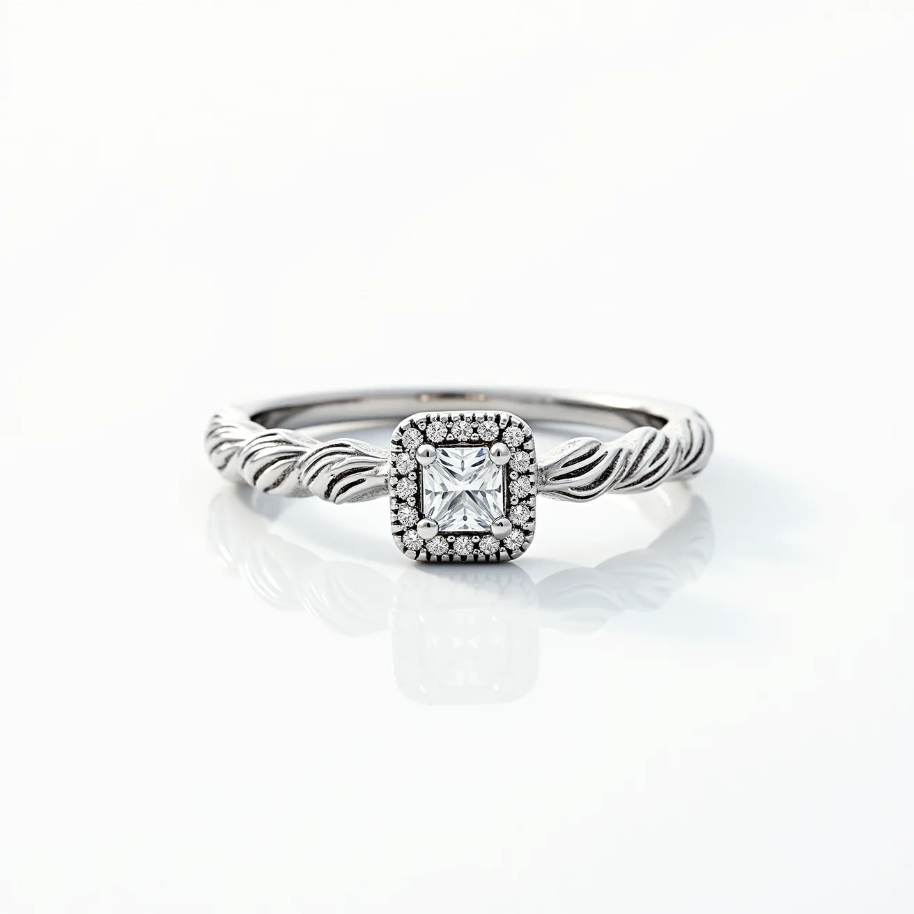 This silver wedding ring features a delicate twisted band that elegantly wraps around the finger. At its center, a striking square-cut gemstone, likely a diamond, is encased within a halo of smaller stones that accentuate its sparkle. The stones are set in a classic prong setting, securely holding them in place while allowing maximum light to enhance their brilliance. The ring showcases a harmonious blend of intricate metalwork and radiant gemstones, making it a timeless piece of jewelry.