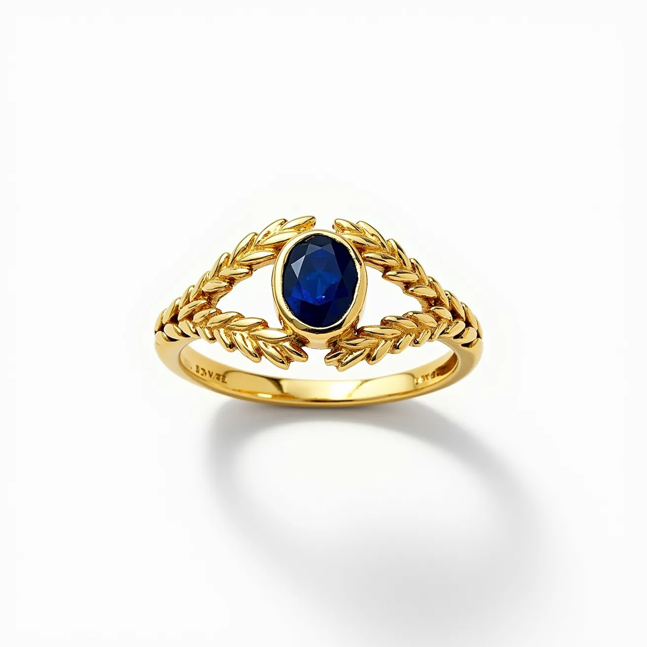 This Solomons ring features a beautifully crafted design made of gold, showcasing a striking blue gemstone as its centerpiece. The gem is an oval cut, enhancing its luster and presence in the setting. The stone is encircled by an intricate gold setting resembling laurel leaves, adding an element of elegance and symbolism. The smooth finish of the gold band complements the ornate design, making the ring both visually appealing and structurally cohesive.