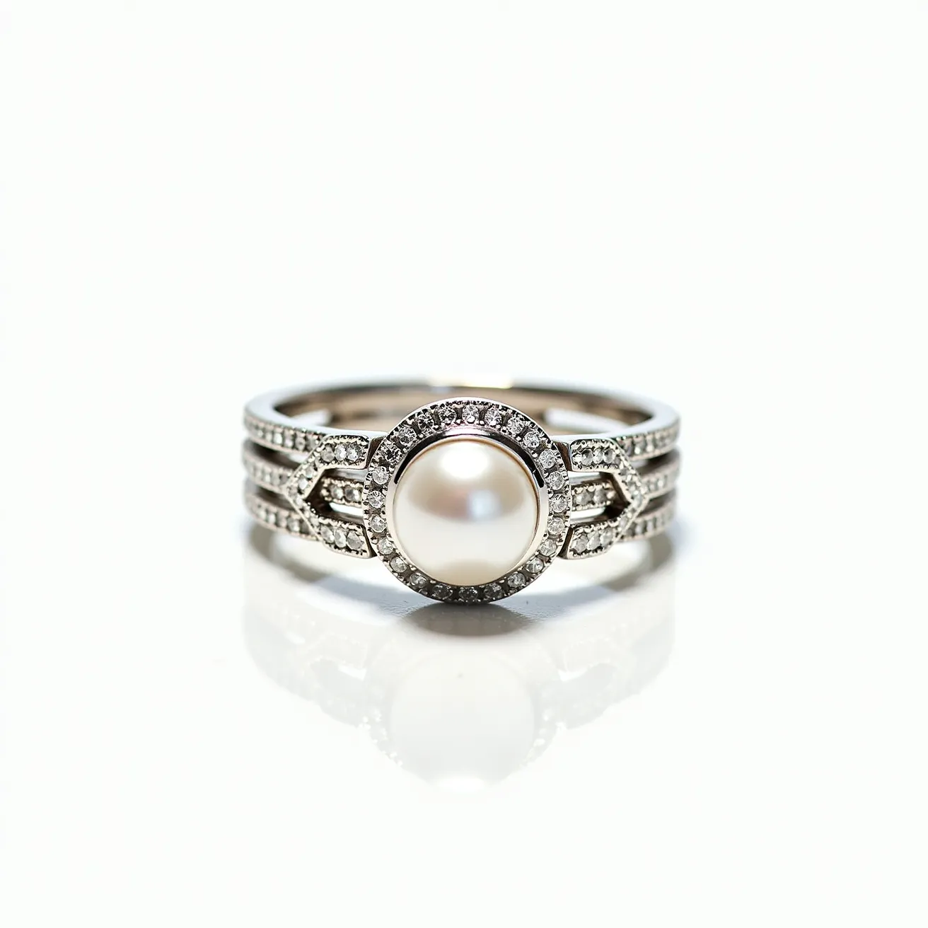 This stackable diamond ring features a prominent round pearl at its center, encircled by a delicate halo of small, round-cut diamonds set in a pave setting. The band of the ring is crafted from a bright, reflective metal, likely white gold or platinum, which complements the lustrous pearl and shimmering diamonds. The band is designed with three rows, each embellished with small diamonds that add to the overall sparkle and elegance of the piece. The absence of clasps or attachments suggests a continuous band, allowing for stacking with other rings. The combination of pearls and diamonds creates a classic yet elegant aesthetic.