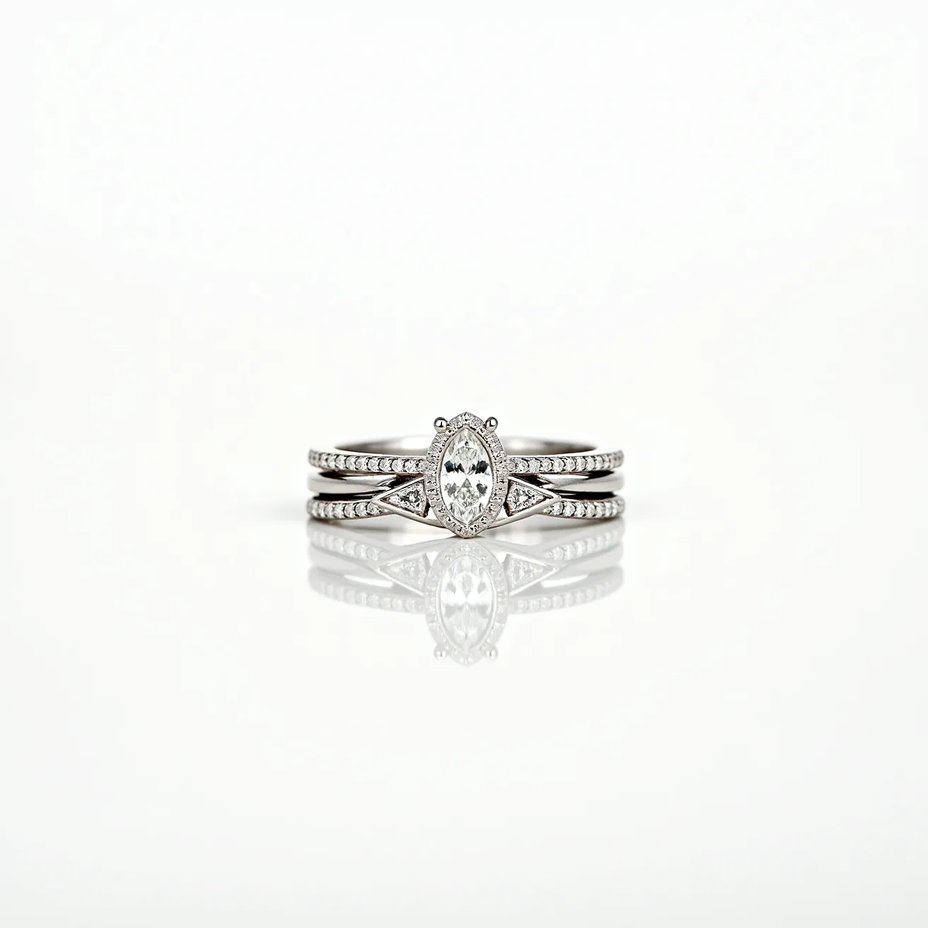 These stackable rings feature a central marquise-cut gemstone, likely a diamond, set prominently in a prong setting. The design includes additional small round stones, possibly diamonds, adorning the band, creating a lined pattern around the main ring. The rings are crafted from a shiny metal, possibly white gold or platinum, which complements the sparkle of the stones. Each ring is designed to seamlessly stack together, creating a cohesive and elegant look without the need for any clasps or attachments.