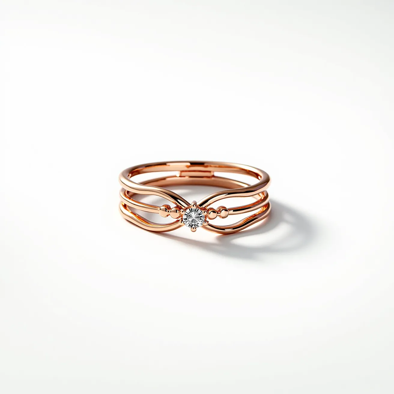 These stacked wedding rings feature a refined and elegant design comprising rose gold bands and a central gemstone. The gemstone is a round-cut diamond, securely set in a four-prong setting that enhances its sparkle and prominence. The rose gold bands are intricately crafted, with delicate intertwining details that add a sense of harmony and unity to the overall look. Each band aligns seamlessly with the others, creating a cohesive and stylish ensemble. This composition showcases both traditional and contemporary elements, resulting in a timeless piece of jewelry with a modern twist.