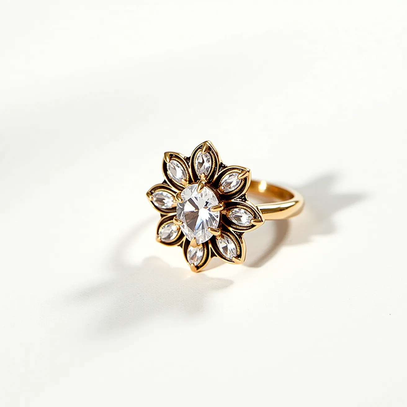 This statement ring features a striking floral design with a large central gemstone surrounded by an arrangement of smaller marquise-cut stones, reminiscent of petals. The central gem is an oval cut, with a brilliant sparkle, set in a prong setting that securely holds it in place. The surrounding marquise-cut stones are also held in bezel settings, enhancing their elegance. The ring is crafted from a shiny gold-colored metal, which adds a luxurious touch and provides a beautiful contrast to the clear stones. The band is smooth, without any additional clasps or attachments, creating a seamless and polished finish that highlights the intricate design of the floral centerpiece.