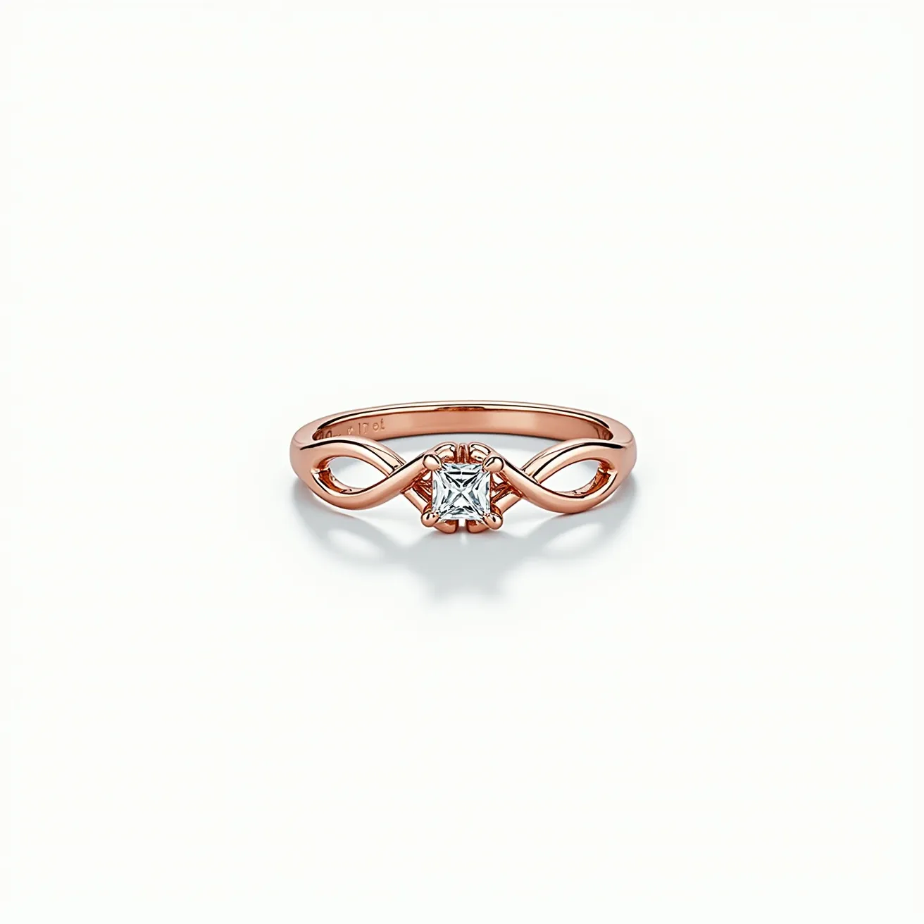 This two birthstone ring features a delicate rose gold band intricately designed in an infinity shape. At its center, a single, prominently placed gem, likely a diamond or similar clear stone, is cut in a princess shape and secured with a decorative prong setting. The band elegantly intertwines around the stone, creating a harmonious and timeless style. The design appears seamless, without any visible clasps or attachments, emphasizing the elegant simplicity and continuity of the piece.