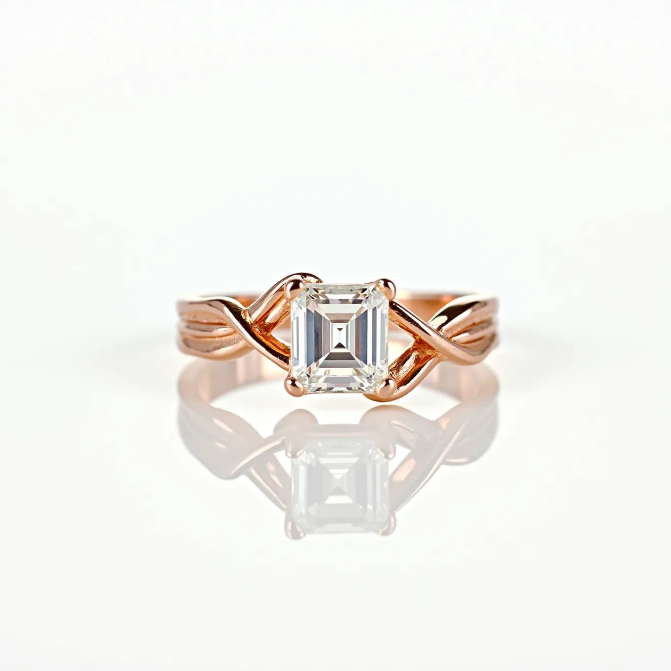 This vine engagement ring features an elegant rose gold band intricately designed to resemble delicate intertwining vines. The centerpiece is a stunning emerald-cut diamond, secured in a classic prong setting that enhances its brilliant clarity and facets. The band’s design flows seamlessly around the stone, showcasing the vine motif that gives the ring its distinctive character. The use of rose gold adds a warm and romantic touch to the overall aesthetic, complementing the stone’s lustrous appearance.