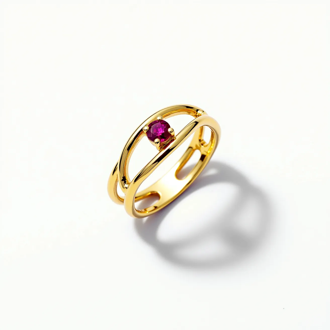 This vine ring features a delicate design crafted from gold, forming a split band that gracefully frames the finger. At its center, the ring showcases a round cut red gemstone, likely a ruby, held securely in a four-prong setting. The open band style lends an airy elegance, while the stone adds a vibrant focal point. There is no visible clasp or additional attachments, keeping the design simple yet sophisticated.