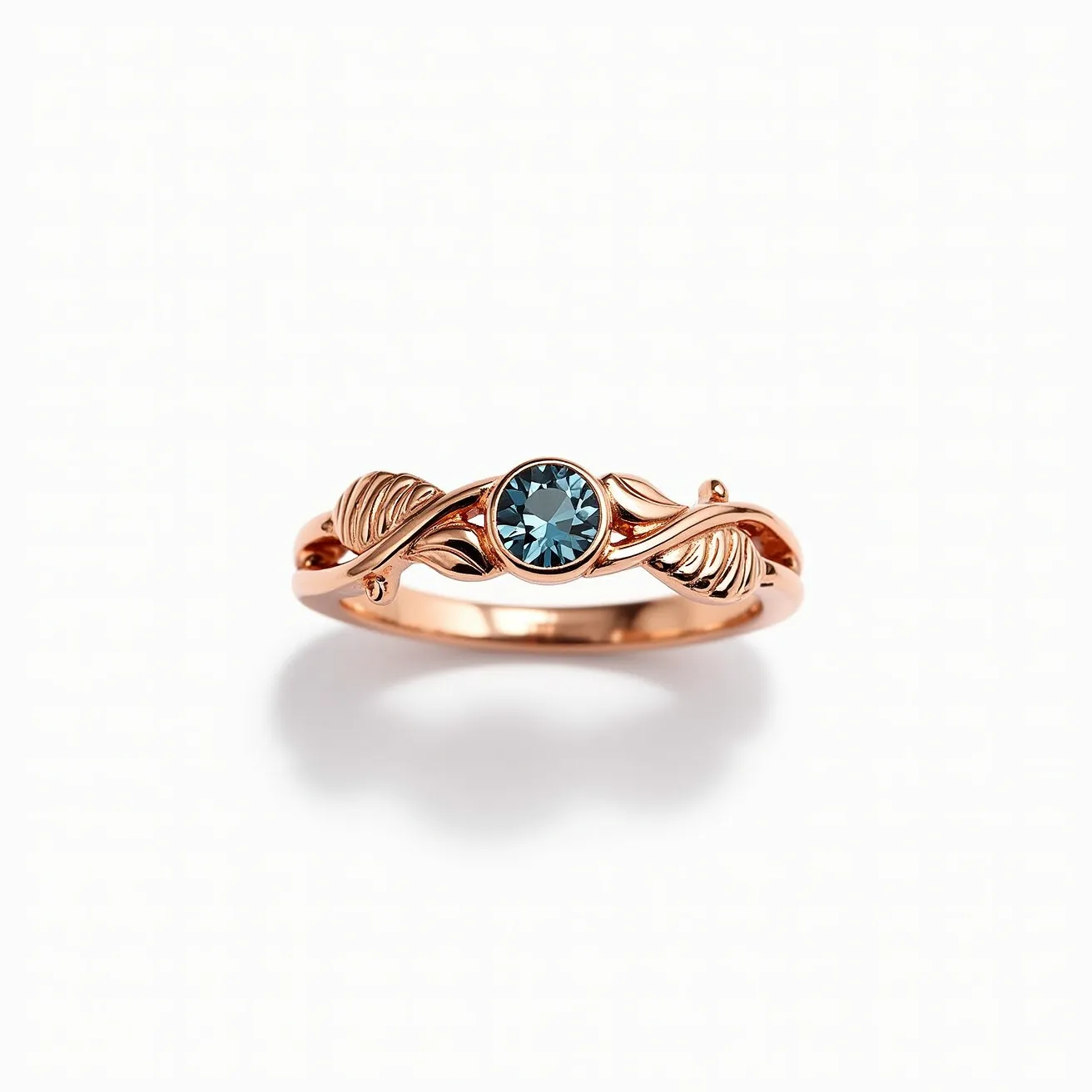 This wedding band features a striking rose gold construction, showcasing a central round-cut blue gemstone set in a secure bezel setting. The band is intricately designed with leaf motifs on either side of the gemstone, adding an elegant, nature-inspired touch. The craftsmanship highlights the beauty of the metal and the stone, making it both a decorative and symbolic piece.