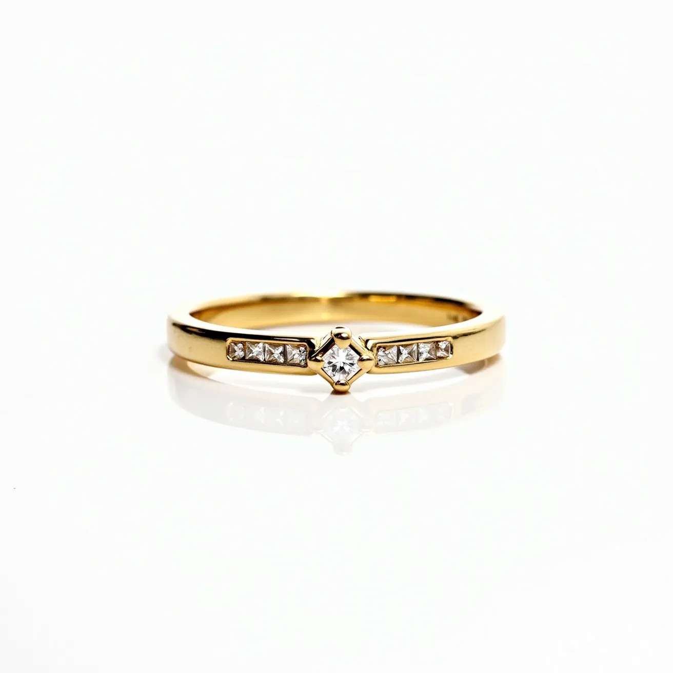 This wedding band is crafted from yellow gold, featuring a central square-cut diamond set in a secure bezel setting. Flanking the central diamond are smaller square-cut diamonds, also set into the band, creating a seamless, channel-set design. The band is polished to a high shine, highlighting the brilliance of the stones against the rich gold material. The elegant arrangement of the gems ensures a continuous sparkle, enhancing the overall sophistication of the piece.