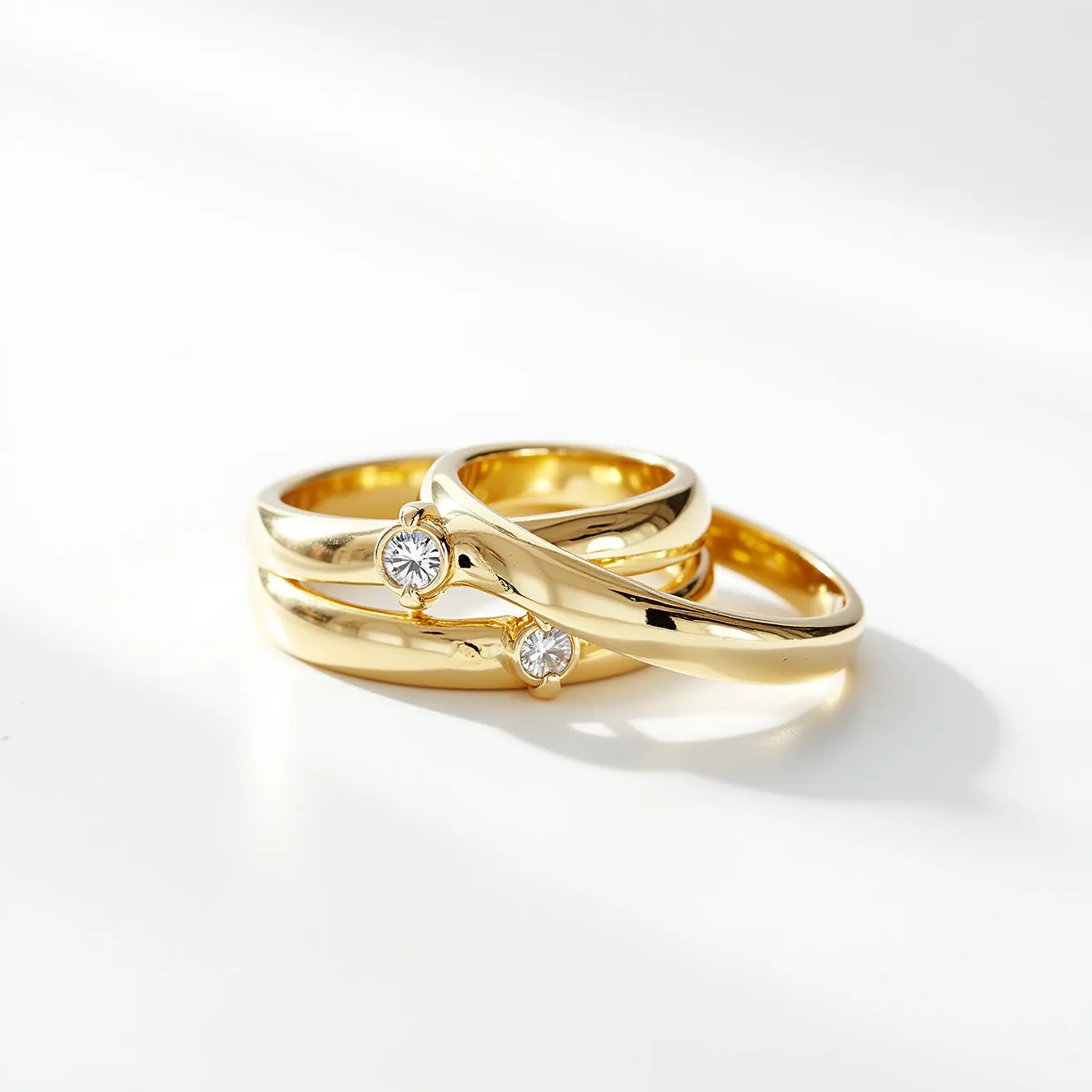 These wedding ring sets are crafted from polished gold, featuring a sleek and elegant design. The rings include round-cut diamonds as the central gemstone, each set in a prong setting that highlights the beauty and clarity of the stones. The smooth, shiny bands add a classic touch to the overall aesthetic. The seamless integration of the gems with the bands creates a harmonious and timeless appearance, making these rings perfect for symbolizing everlasting commitment.