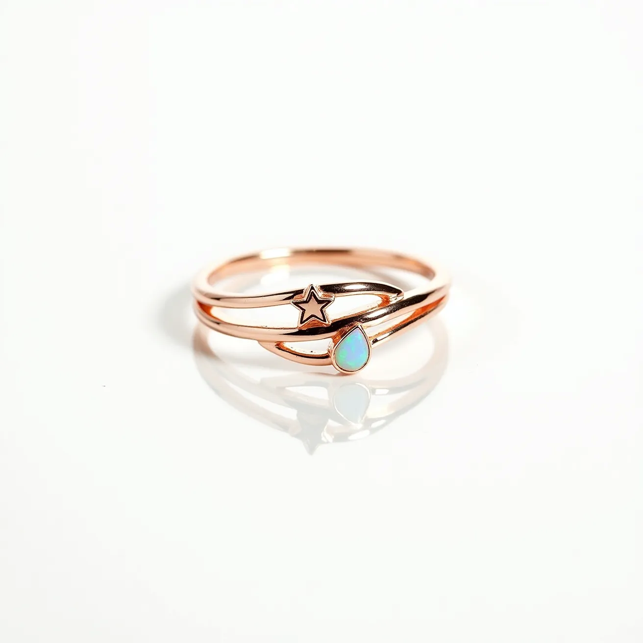 This wrap ring is elegantly crafted from rose gold, featuring a minimalist design that incorporates a small star and a teardrop-shaped gemstone. The gemstone appears to be an opal, set in a bezel setting, which enhances its iridescent qualities. The band of the ring smoothly wraps around the finger, providing a seamless and stylish look without any visible clasp or attachment. The combination of the star and the opal creates a charming celestial motif, adding a touch of whimsy to the sophisticated design.